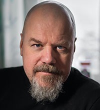 Ansiktsporträtt Michael Rosander.